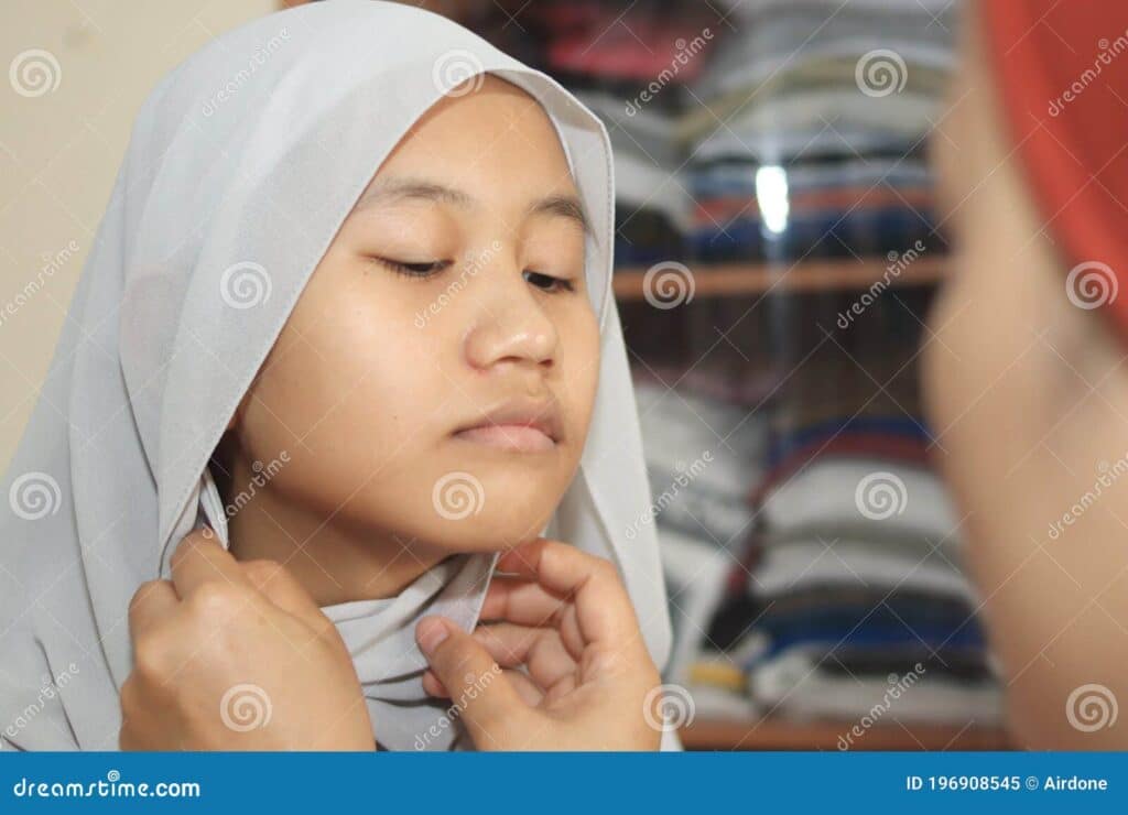 Muslim Girl Wearing Hijab with the Help of Her Mother, Islam ...
